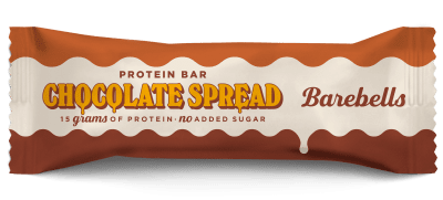 Zoom bild av Barebells Chocolate Spread proteinbar 45g i brunt och beige förpackning med texten High Protein 15 grams och No Added Sugar